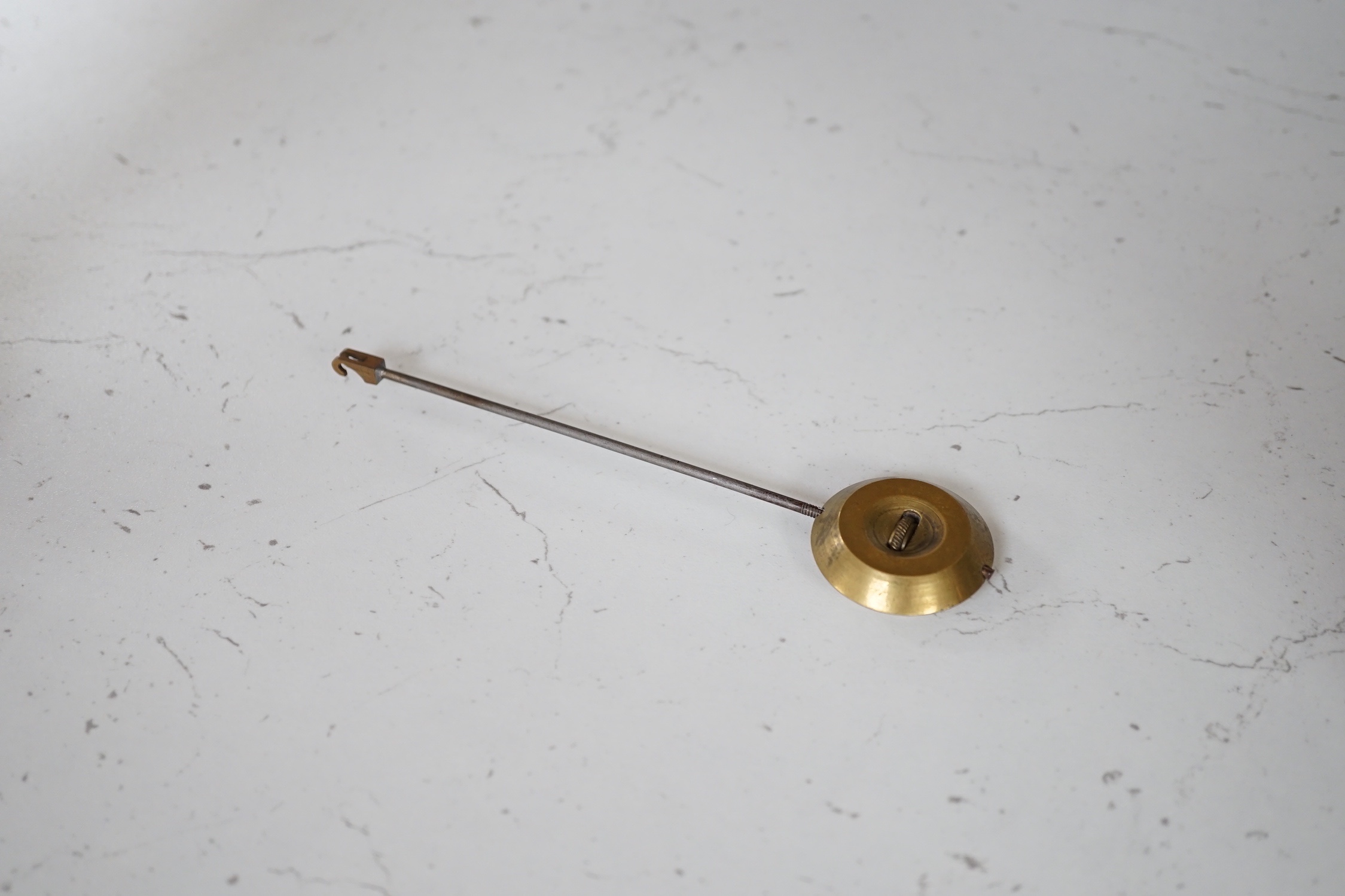 A French gilt metal and porcelain clock garniture. 36.5cm